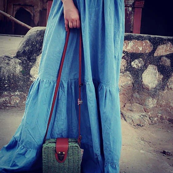 Long flared denim dress with a tote bag 