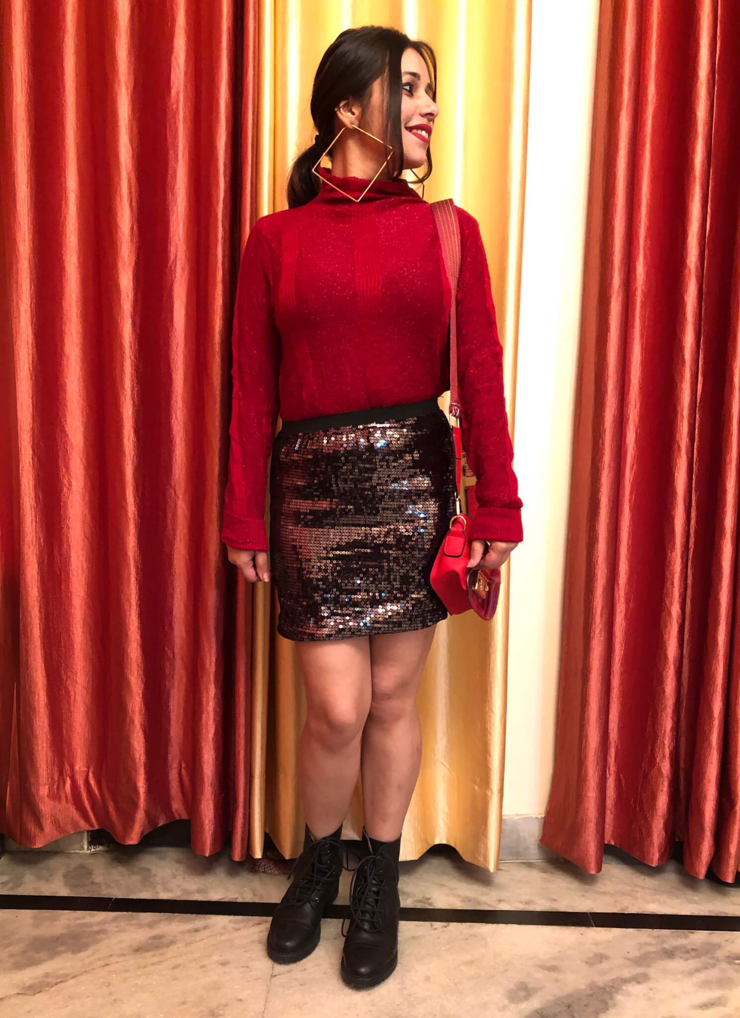 A turtleneck top with a sequin skirt-winter season outfit ideas